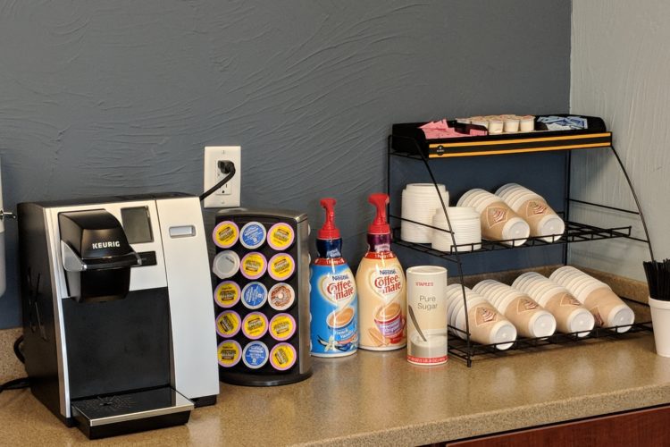 Coffee machine and coffee cups at Cole White Dental